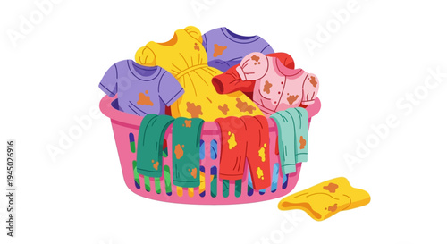 Colorful toy clothes and hangers in a pink basket on a white background
