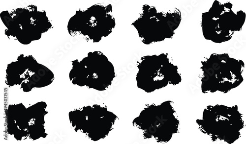 A collection of 12 black inkblots on a white background