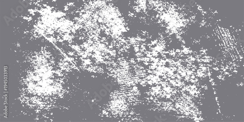 Abstract a textured grey background with a rugged, paint-splattered aesthetic that evokes a sense of raw energy and dynamic artistic expression. 