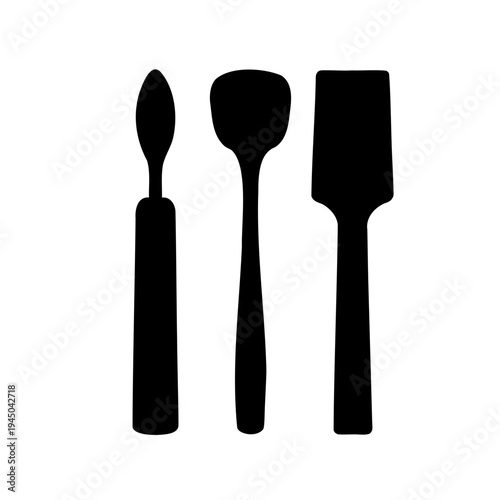 Silhouettes of essential kitchen utensils including a palette knife, spoon, and spatula Vector, illustration