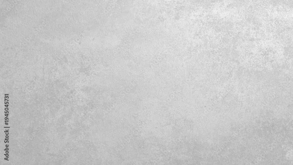 Fototapeta premium Gray textured surface with subtle variations and mottled pattern
