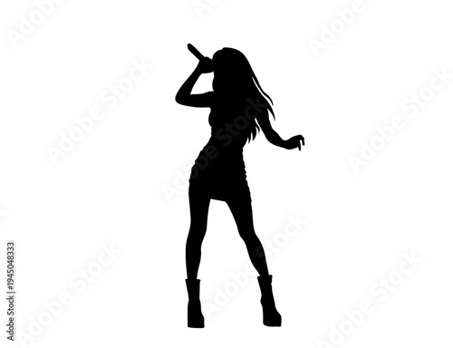 Silhouette of a beautiful female singer performing with microphone
