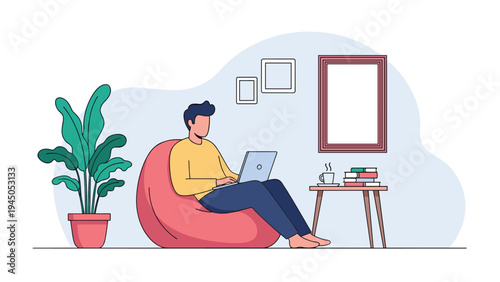 Young man working remotely on laptop while relaxing in comfortable beanbag chair in home office environment.