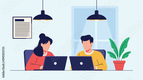 Coworkers sitting at desk and working on laptops in bright office space with professional atmosphere.