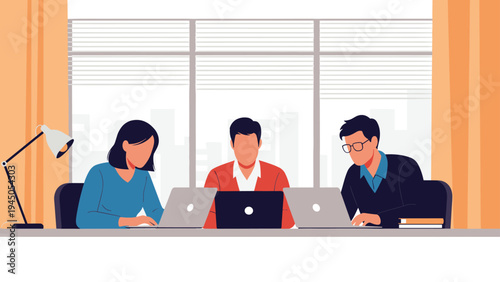 Professional team of coworkers focused on their tasks while working together on laptops at a shared desk in a modern office.
