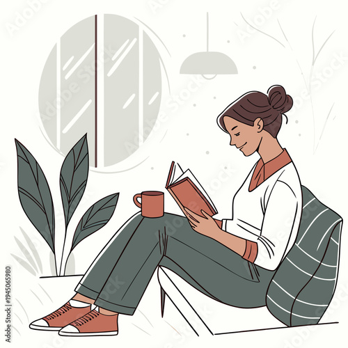 Woman sitting on chair reading book with coffee