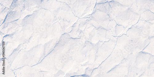 Neutral toned background featuring a light beige or off-white surface with realistic crumpled paper textures with a soft plaster wall, making it ideal for minimalist branding.	