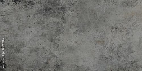 Dark grey concrete wall texture with weathered cement surface includes natural imperfections, cracks, and dark atmospheric stains for urban-style designs, architectural mockups.
