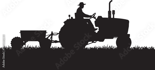 Black silhouette of man driving tractor with trailer through grass