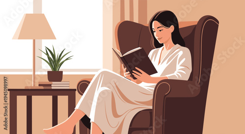 Relaxed young woman sitting in a comfortable armchair and reading a book in a cozy living room setting near a window.