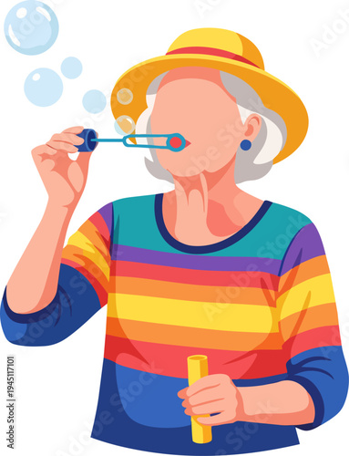 An elderly woman with white hair and a yellow hat, wearing a vibrant striped shirt, joyfully blows bubbles with a wand, holding a bottle of solution.