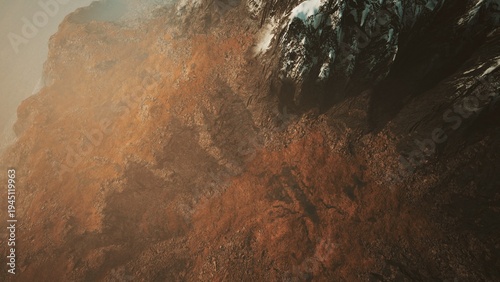 Obraz na płótnie Majestic mountains rise dramatically under a golden sky where snow meets rich earth tones, creating a breathtaking landscape at dusk