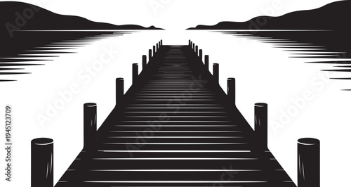 Black and white of a dock extending into a body of water