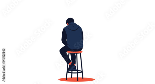 Young man wearing a dark blue hoodie and black pants sitting on a tall bar stool with his back turned against a plain white background.
