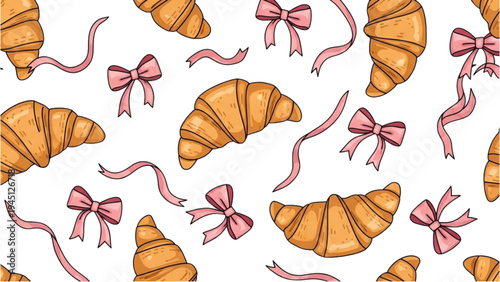 Pastries and ribbons are scattered on a table with croissants