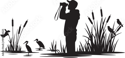 Man taking of birds in wetland with cattails silhouette