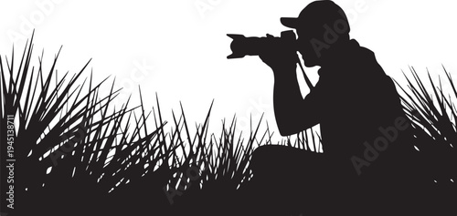 Silhouette of photographer taking in grass camera nature