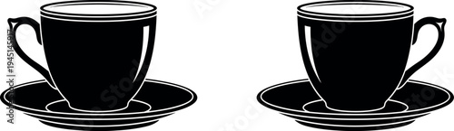 Two black coffee cups on saucers side by side on a white background
