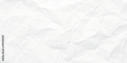 abstract white crumpled paper texture featuring soft wrinkles and natural folded creases minimal monochrome surface for design backdrop