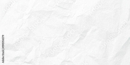 abstract white crumpled paper texture featuring soft wrinkles and natural folded creases minimal monochrome surface for design backdrop