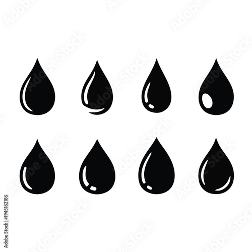 Collection of shiny black teardrop shapes.