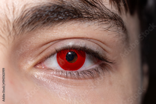 Принти на полотні A striking red eye with intense gaze captivating detail and dramatic effect for