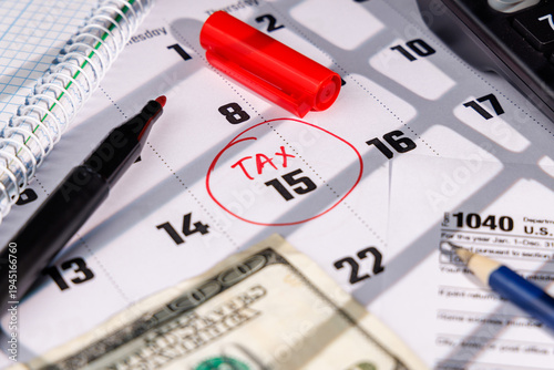 Tax Day concept with a red circle on 15 and IRS Form 1040 near a hundred dollar bill for professional financial services ads.