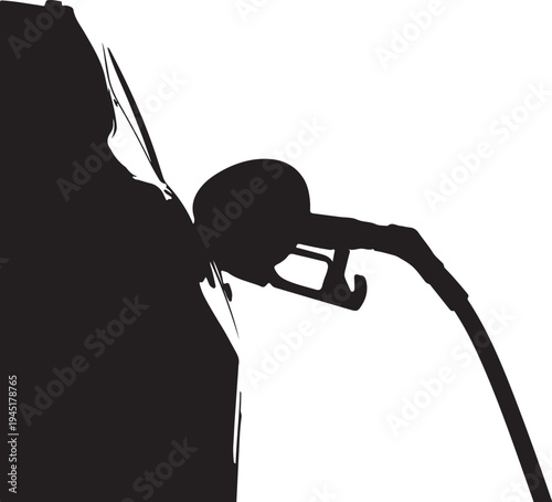Silhouette of a person filling a car with gasoline at a fuel station.