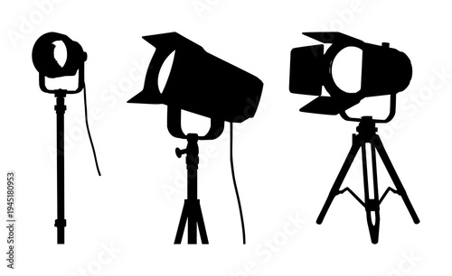 Spotlights set with solid black silhouette of a vintage theatrical spotlight on a stand featuring film noir, precise edges, white background with black silhouette and spotlight