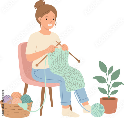 Woman sitting on chair happily knitting sweater with yarn ball and plant nearby