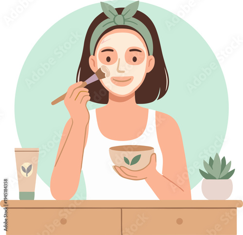 Woman applying facial mask with brush at home in bathroom
