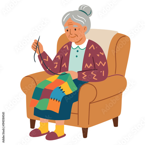 An elderly woman sits in a chair happily knitting a patchwork blanket.