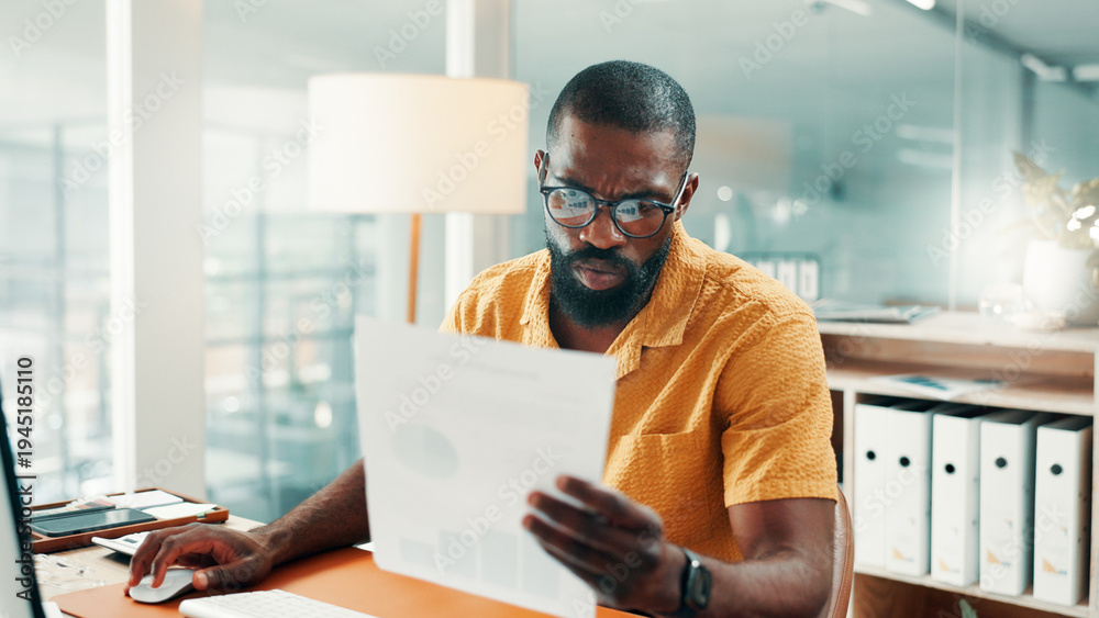 Fototapeta premium Creative agency, reading and black man in office, documents for sales report and charts for revenue. African person, employee and professional with paperwork, planning and review for profit growth