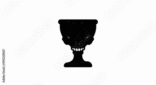 Black skull chalice with menacing grin and glowing eyes