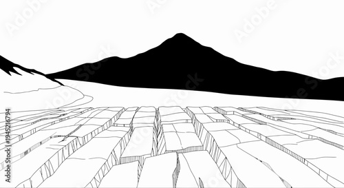 Cracked Ice Field with Mountain Silhouette and Snowy Peaks