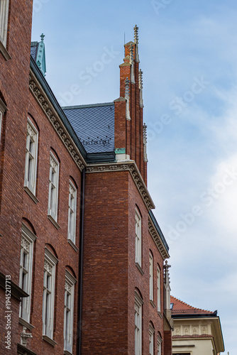 Historic red brick building with Gothic architecture