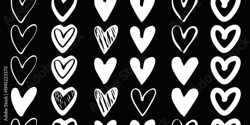 A seamless pattern of various white hearts on a black background