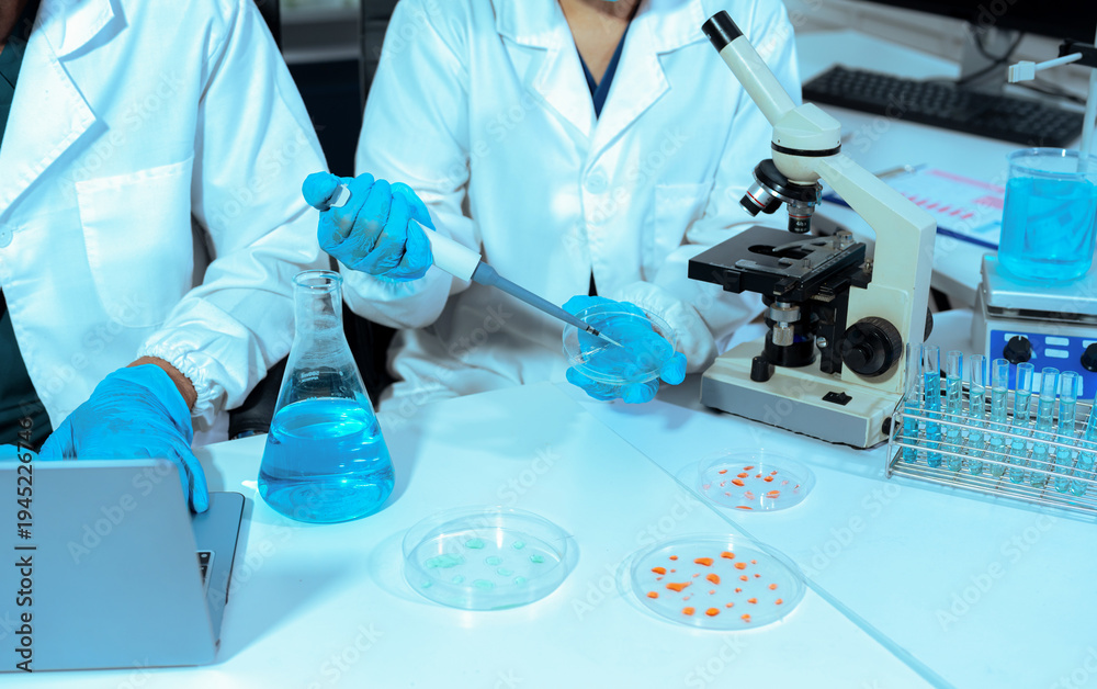 Fototapeta premium Chemist scientist or doctor working in research laboratory, medical analysis, documents, scientific study.