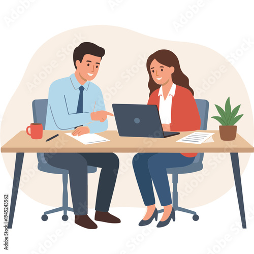 Two colleagues discuss documents and work on laptop at office desk