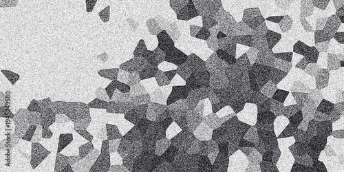 Abstract geometric mosaic pattern in grayscale with sharp edges and varying shades creating a fragmented or crystalline background texture