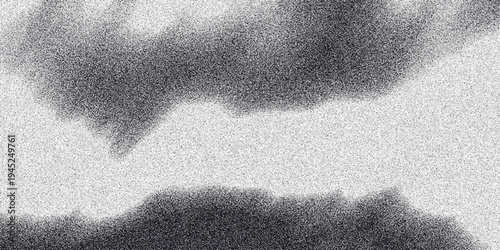 Abstract grayscale cloudy texture with grainy noise and soft diffused light creating a moody atmospheric or ethereal background effect