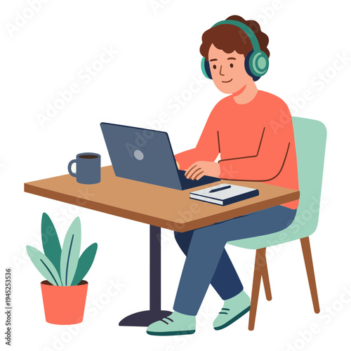 Person working on laptop with headphones sitting at desk indoors