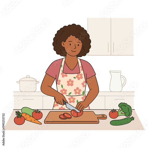 A woman in an apron chopping vegetables on a kitchen countertop with a knife.