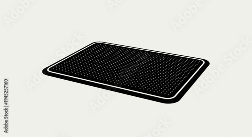 Black rubber doormat with textured surface and white border, isolated on light background