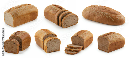 Various brown bread loaves and slices on white background
