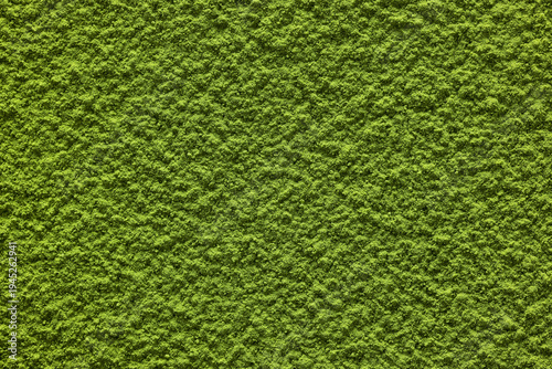 抹茶の粉末を敷き詰めた質感のある和風背景テクスチャ素材　Matcha green tea powder texture background and Japanese style material