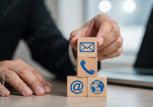 Businessman building communication blocks for effective connectivity