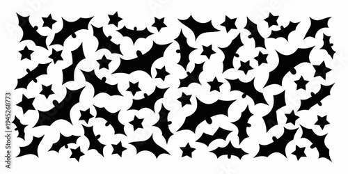 Abstract black and white pattern of scattered star like shapes