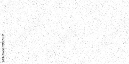 Abstract granular texture background with a dense scattering of tiny grey particles on a bright white canvas for modern design and visual effects