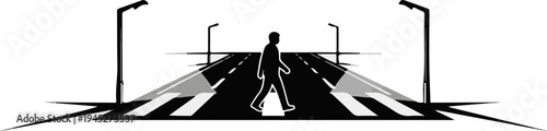 Silhouette of person crossing a street with streetlights on both sides